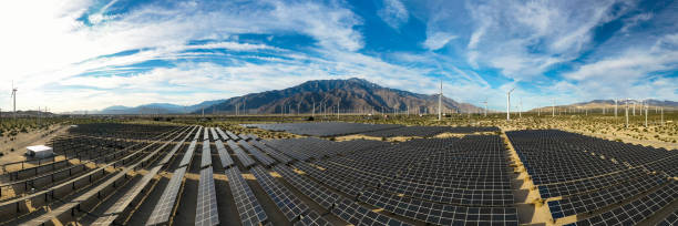 vista aerea su pannelli solari e mulini a vento - solar panel wind turbine california technology foto e immagini stock