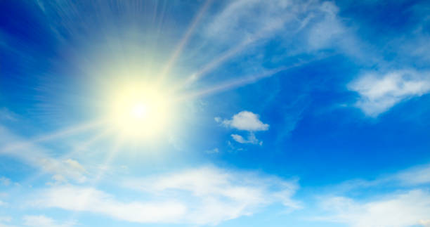 istock Blue sky, sun and clouds. Wide photo. 1367402741