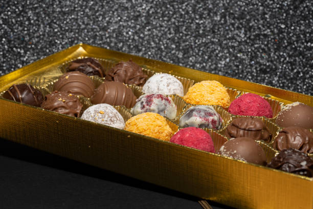istock Round chocolate in a golden box 1367406184