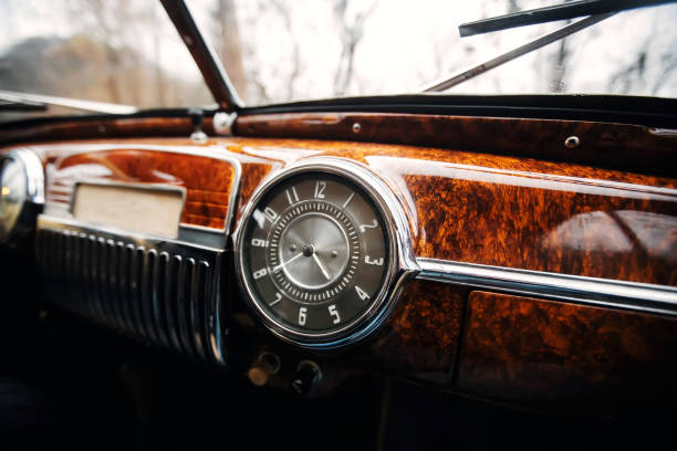istock Vintage car brown marble dashboard with retro gauges 1367409229