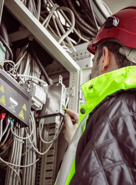 istock Electrician is testing equipment in high voltage power station. 1367411341