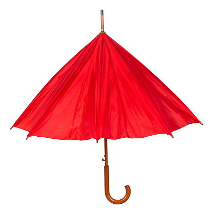 Half opened red colored rain umbrella on white background.