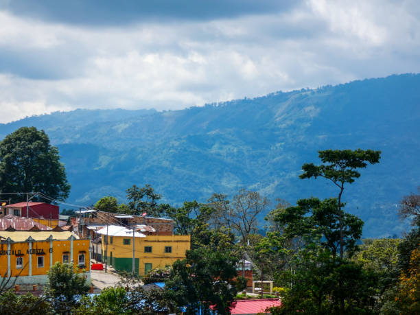 istock Mountains behind the houses 1367420401