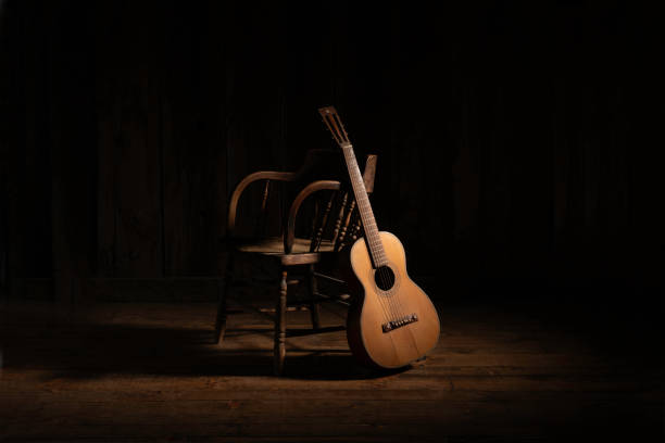istock Barn wood background with chair, guitar 1367421544