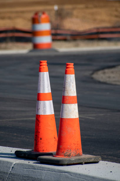 istock Traffic Cones At New Parking Lot Construction 1367421618