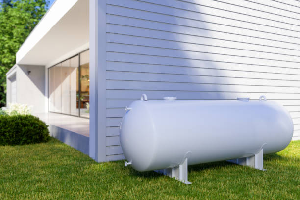 Exterior Of Villa With Propane Gas Tank In The Backyard Exterior Of Villa With Propane Gas Tank In The Backyard propane stock pictures, royalty-free photos & images