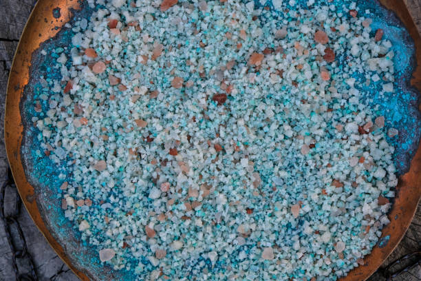 istock Himalayan salt crystals on an oxidized copper plate. 1367461819
