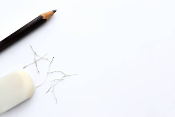 istock Brown pencil, white eraser and white eraser scrap on desk. copy space, top view. 1367462619