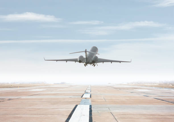 istock Modern corporate business jet take off from airport runway 1367466426