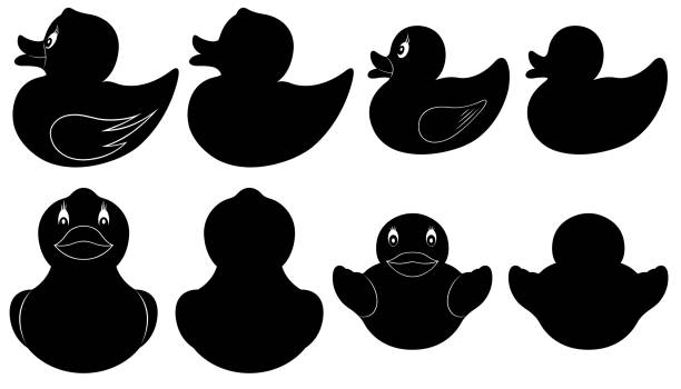 Set of different rubber ducks Set of different rubber ducks isolated on white bathroom silhouettes stock illustrations