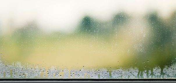 Condensation on the window glass, blur on background