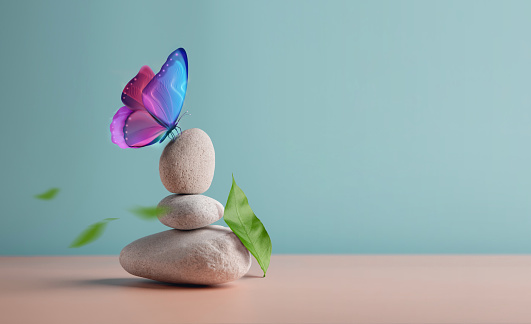Harmony of Life Concept. Surrealist Butterfly on the Pebble Stone Stack. Metaphor of Balancing Nature and Technology. Calm, Mind, Life Relaxing and Living by Nature