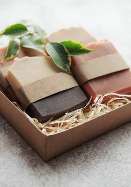 istock Handmade soap bars and green leaves 1367480641