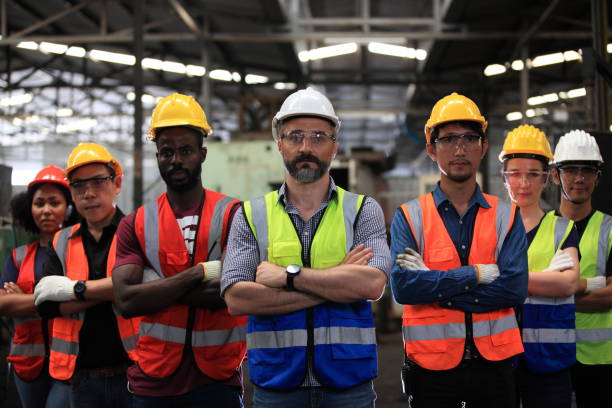 istock engineer team  full skill quality for maintenance and training  in industry factory worker , warehouse Workshop for factory operators, mechanical engineering team production. 1367480988