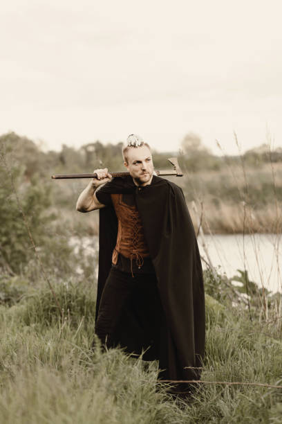 istock A young man with an interesting depicts a Viking with an ax in an unreliable stylized modern costume 1367482092