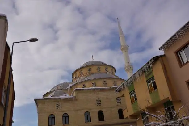 Photo of Erzurum, Turkey 02. 20 2021
Snow and Ice on the Roof of a mosque (Turkish: Tufanç Kardeşler Camii) Travel Turkey. Snowfall. Cold weather -50 degrees Celsius, winter. Freeze, freezing.
Roof ice dams