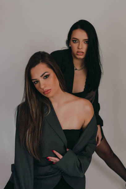 istock Two fashionable young women 1367485951