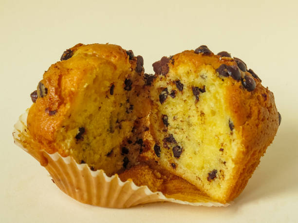 istock Chocolate chip muffins isolated on white 1367489577