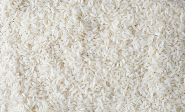 Rice background Rice top view background rice food staple stock pictures, royalty-free photos & images