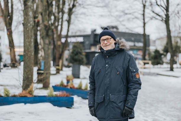 istock Senior man in warm winter clothes 1367493883