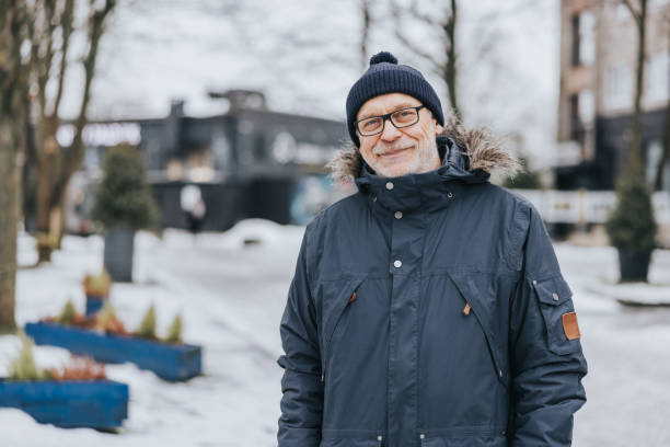 istock Senior man in warm winter clothes 1367493884