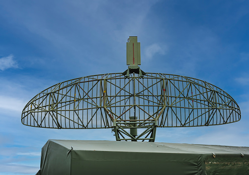 Mobile military radar unit for air surveillance.