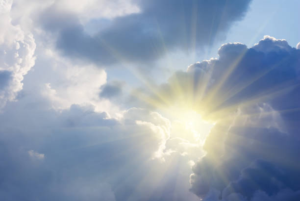 istock sparkle sun push through the dense clouds, natural sky background 1367496207