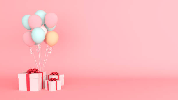 istock Colorful balloon and gift boxes on pink background with copy space for text, 3d rendering 1367501346