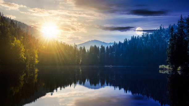 istock time change above landscape with lake in summer 1367505679