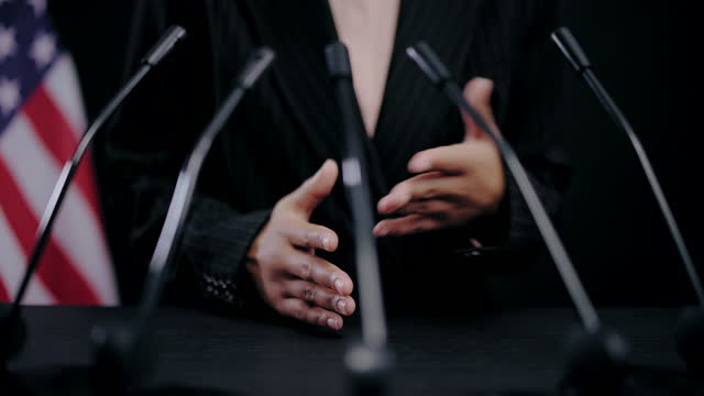 Hands of American female politician speaking at debate, presidential campaign