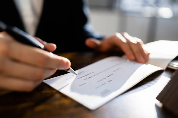 istock Writing Money Cheque. Sign Check 1367507413