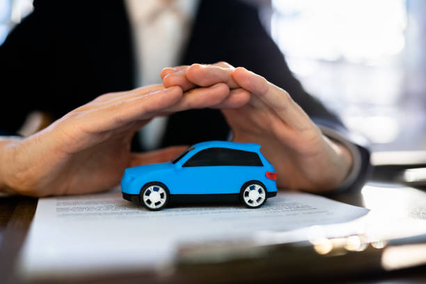 istock Miniature Toy Car Insurance And Guarantee 1367507418