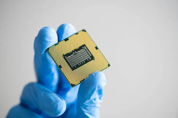 Computer Processor Technology. CPU Semiconductor Hardware In Hand
