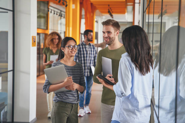 istock Enthusiastic young people working for persepctive modern company 1367511487