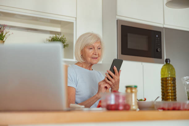 istock Retired woman resting at cozy home kitchen 1367511561