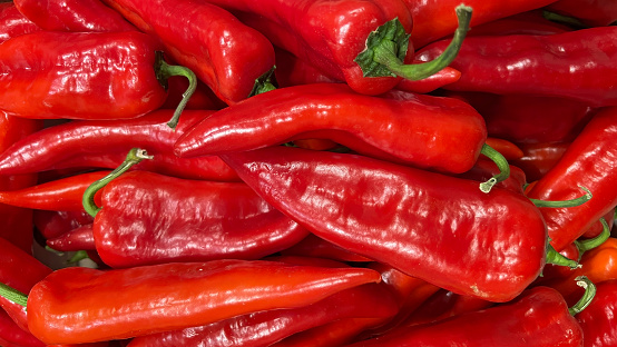 Background from fresh red hot peppers. . High quality photo