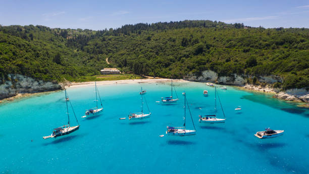istock Group of sailboat near beautiful beach 1367520619