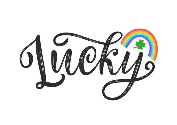 szczęśliwe słowo celtycka kaligrafia pędzla ozdobiona tęczą i czterolistną koniczyną koniczyny. - luck stock illustrations