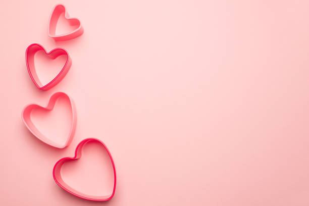 istock Heart shape on a pastel pink background. 1367527551