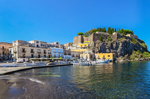 Lipari with the port Marina Corta and the castle complex from the 16th century with the Cathedral of San Bartolomeo and the Chiesa delle Anime del Purgatorio in Sicily in Italy
