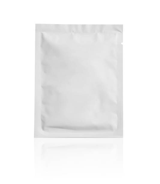 Blank white aluminium foil plastic pouch bag sachet packaging mockup isolated on white background stock photo