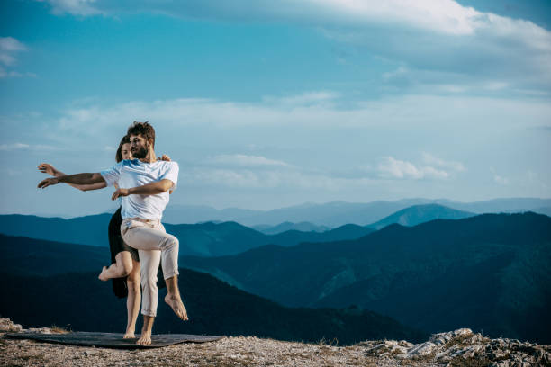 istock Beauty couple dancing social dance over sky with clouds 1367531506