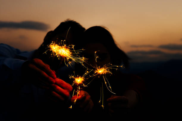 istock Christmas sparkler on black background. Bengal fire 1367531664