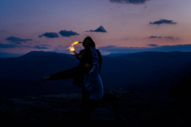 istock The young attractive modern ballet dancers on mountain hill 1367531700