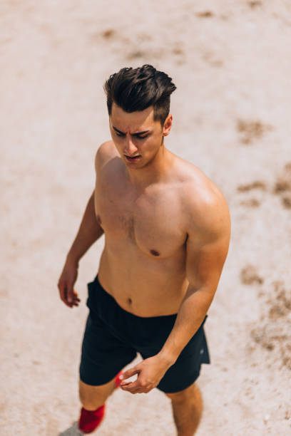 istock Muscular Caucasian man resting after exercise 1367532483