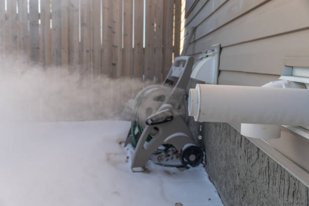 istock furnace Exhaust pipe blowing out steam in winter 1367537122