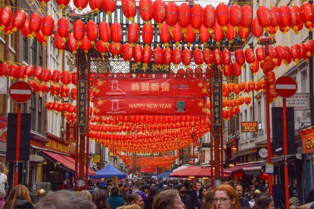 lunar new year decorations in chinatown, london, uk - praça leicester imagens e fotografias de stock