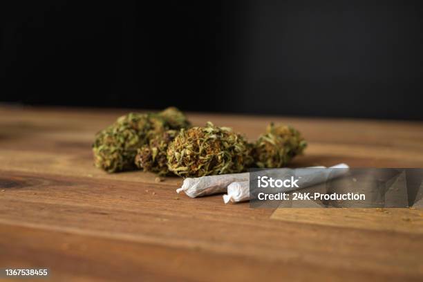 Male Hands Rolling Marijuana Joint Stock Photo - Download Image Now - Cannabis Plant, Cannabis - Narcotic, Smoking - Activity