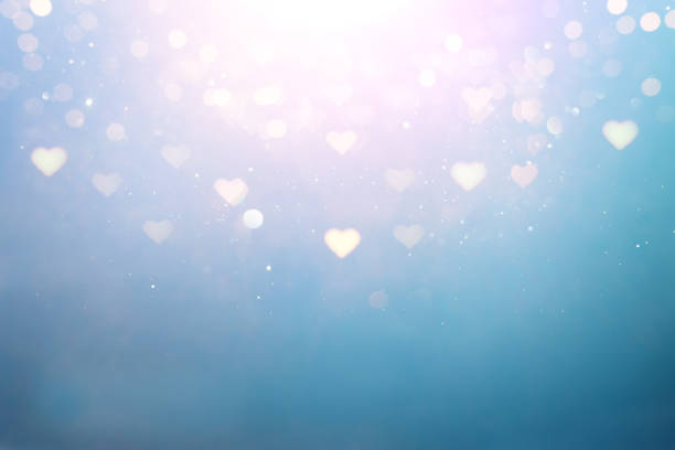 istock blue and pink glitter vintage lights background. defocused. hearts overlay 1367539018