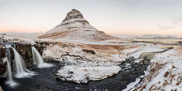istock Kirkjufell mountain and waterfall at sunrise, Iceland 1367539955